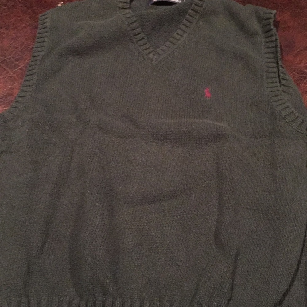 Sleeve less V-Neck Sweater.